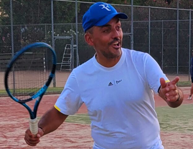 Mauro hitting a forehand